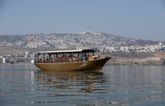 Tiberias  is a city on the western shore of the Sea of Galilee. The picture shows a Pilgrim' s boat on the lake. Photo by Itamar Grinberg.